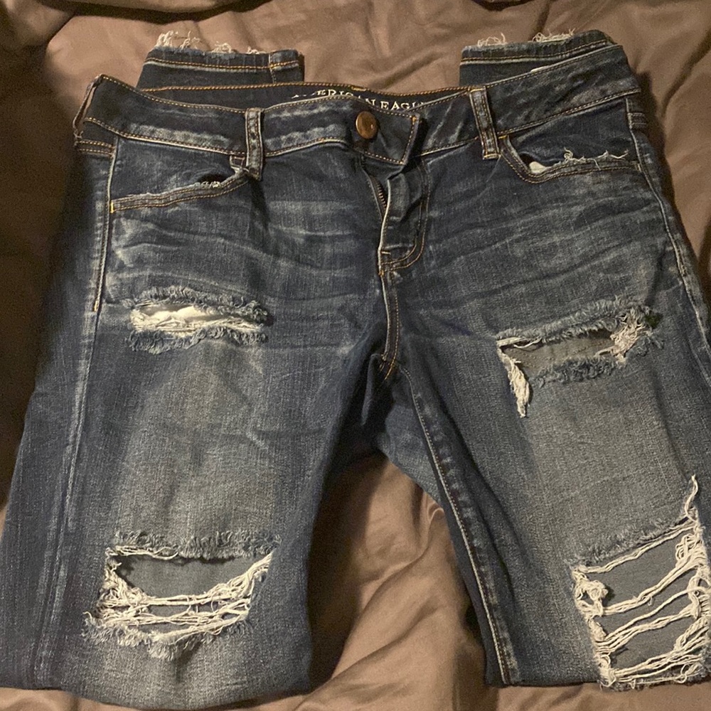 Dark wash American Eagle jeans with holes